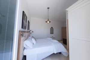 A bed or beds in a room at B&B Villa Cinzia