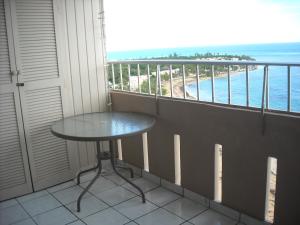 A balcony or terrace at Ocean Front Apartment
