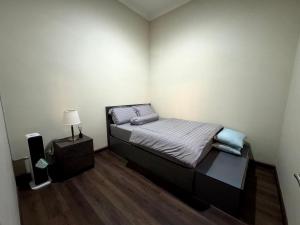 Postel nebo postele na pokoji v ubytování Seruni Terrace - Guesthouse Bandung