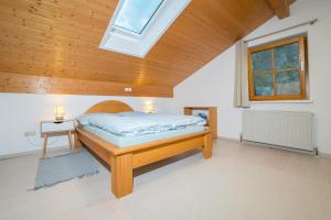 Ένα ή περισσότερα κρεβάτια σε δωμάτιο στο Appartement Hochjochblick