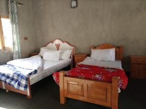 Katil atau katil-katil dalam bilik di Shisper View Hotel