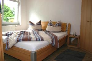 Postel nebo postele na pokoji v ubytování Apartment Kraemer Dax