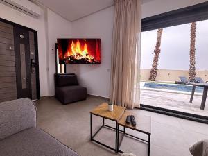 TV a/nebo společenská místnost v ubytování Villa Marrakech DAR JAHYR
