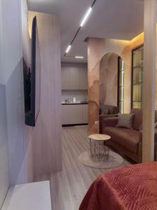 TV a/nebo společenská místnost v ubytování Urban Nest Studio