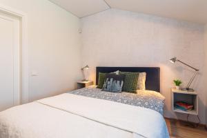 Ένα ή περισσότερα κρεβάτια σε δωμάτιο στο Apartment in the dunes
