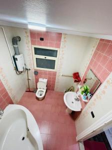 Ένα μπάνιο στο سان هوتيل للشقق الفندقيه