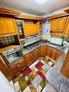 Η κουζίνα ή μικρή κουζίνα στο سان هوتيل للشقق الفندقيه +6 φωτογραφίες