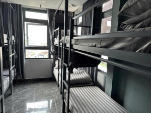 Μία ή περισσότερες κουκέτες σε δωμάτιο στο Dalat Family Center