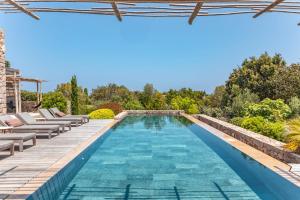 Swimmingpoolen hos eller tæt på Villa Bonanza Di Cala Rossa + 72 billeder