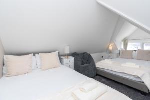 Ένα ή περισσότερα κρεβάτια σε δωμάτιο στο Open Mind Property - 8 Guests & Free Parking