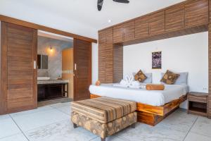 Giường trong phòng chung tại Villa Florida Calme Tropical Grande Piscine
