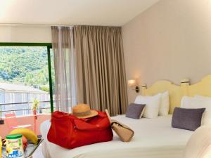 Ένα ή περισσότερα κρεβάτια σε δωμάτιο στο Best Western Gemenos Villa Florette