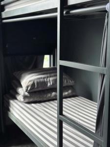 Ένα ή περισσότερα κρεβάτια σε δωμάτιο στο Dalat Family Center