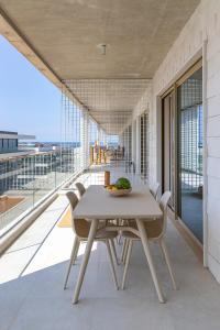 En balkon eller terrasse på Ocean Living by MP