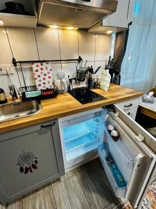 Η κουζίνα ή μικρή κουζίνα στο Urban Wolfie with FREE parking & own bicycle