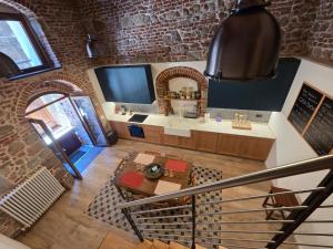 an overhead view of a bathroom with a sink at Casa Betta - A 700 Year Old Tuscan Gem in Chiusdino