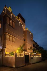 a building with lights on top of it at night at juSTa Luxe Kashi Parampara, Varanasi in Varanasi