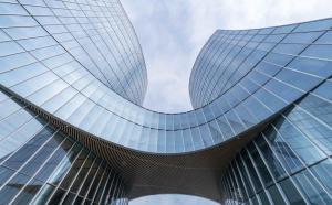 a view of a glass building at Jianguo Hotel HUANQIU in Beijing