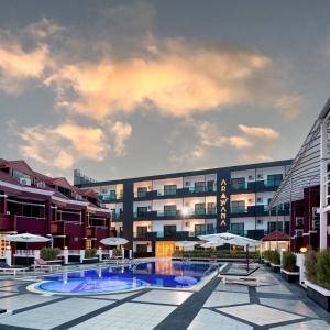 Bazén v ubytování Arawana Regency North Pattaya nebo v jeho okolí