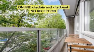 an online check in and check out no reception on a balcony at Anstatthotel Zug - app self-check-in in Zug