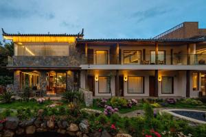 Zahrada ubytování LiJiang Mountain Spring Resort