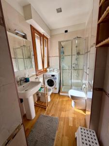 a bathroom with a sink toilet and a shower at The Kaktus House - vicino San siro e Rho Fiera in Milan