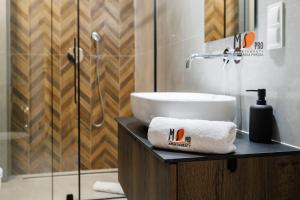 Ванная комната в MS Pro Apartamenty Premium Belle View z mini Spa +15 фотографий