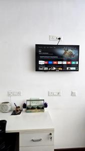 Μια τηλεόραση ή/και κέντρο ψυχαγωγίας στο Skylight Studio - 13th Floor Escape +27 φωτογραφίες