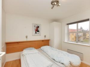 Ένα ή περισσότερα κρεβάτια σε δωμάτιο στο Apartment Enni - 100m from the sea by Interhome