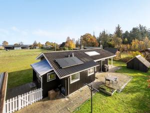 an overhead view of a tiny house in a field at Holiday Home Joon - 300m from the sea by Interhome in Ørsted