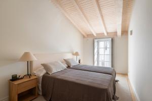 Ένα ή περισσότερα κρεβάτια σε δωμάτιο στο Casa Conde