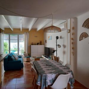 Televisyen dan/atau pusat hiburan di Maison au bord de mer