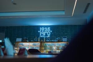 a sign that is on a wall in a restaurant at Best Western Plus Jeddah Hotel Madinah Road in Jeddah +181 photos