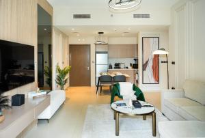 Et tv og/eller underholdning på Chic 1BR Retreat , Blvd Views, Walk to Dubai Mall