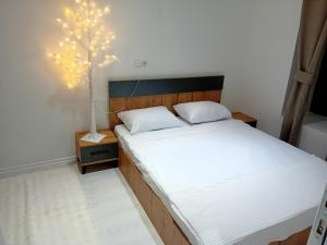 Una cama o camas en una habitación de Apartment D&D