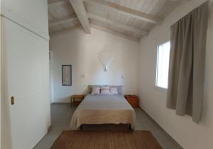 Ένα ή περισσότερα κρεβάτια σε δωμάτιο στο Casa Tuerra