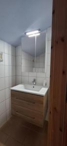 Koupelna v ubytování Fehmarn Ostseeferien FW4 Große Strandperle 115 1