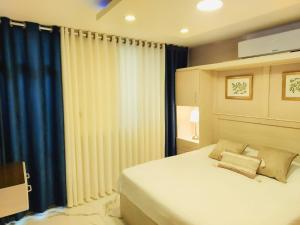 Ένα ή περισσότερα κρεβάτια σε δωμάτιο στο Ammoun Luxury Apartments 2