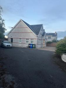 a house with a car parked in front of it at Sonas house in Kilkenny