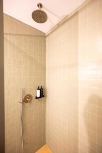 Koupelna v ubytování Orion Hotel