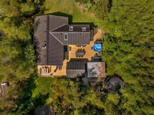 an overhead view of a house with a yard at Holiday Home Hermand - 3-5km from the sea by Interhome in Brovst