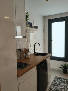 Køkken eller tekøkken på WOWHOLIDAYS Superloft Ronda