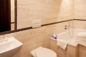 Łazienka w obiekcie Apartamenty Hotelu Pod Orłem