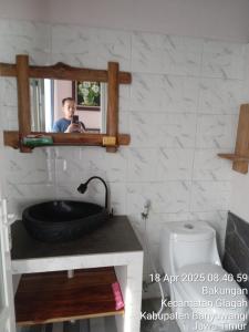 Phòng tắm tại eLvira Homestay