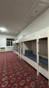 Ένα ή περισσότερα κρεβάτια σε δωμάτιο στο Ask HOSTEL