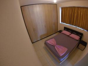 Postel nebo postele na pokoji v ubytování Riviera Rooms