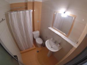Koupelna v ubytování Riviera Rooms