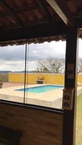 Πισίνα στο ή κοντά στο Suíte Encanto da Roça