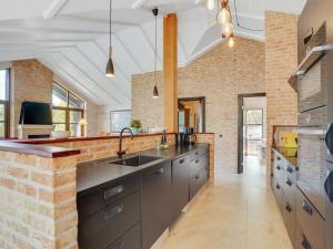 Kuchyň nebo kuchyňský kout v ubytování Holiday Home Andri - 600m to the fjord by Interhome + 18 fotografií