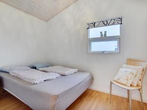 Ένα ή περισσότερα κρεβάτια σε δωμάτιο στο Holiday Home Clarissa - 300m from the sea by Interhome